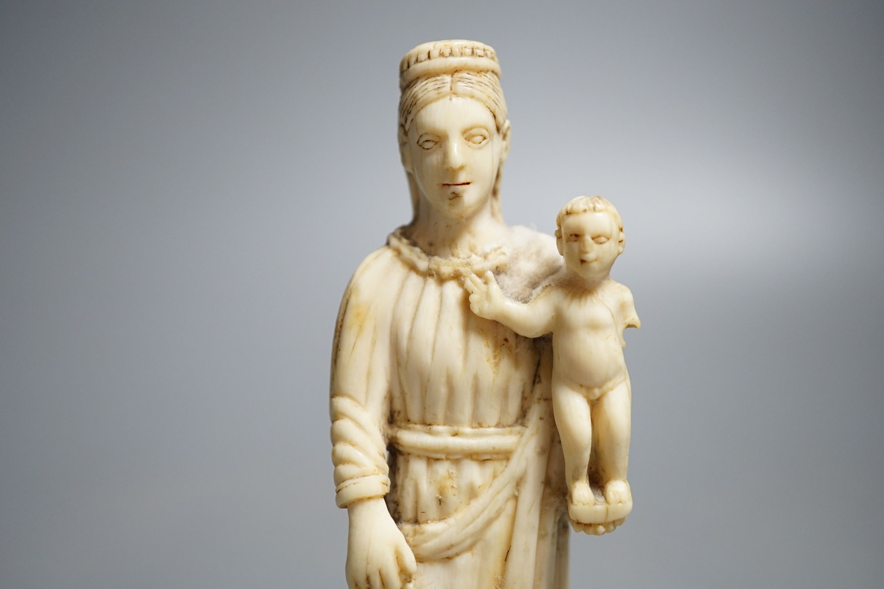 A 19th century Indo-Portuguese carved ivory model of the Virgin and child, height 15cm